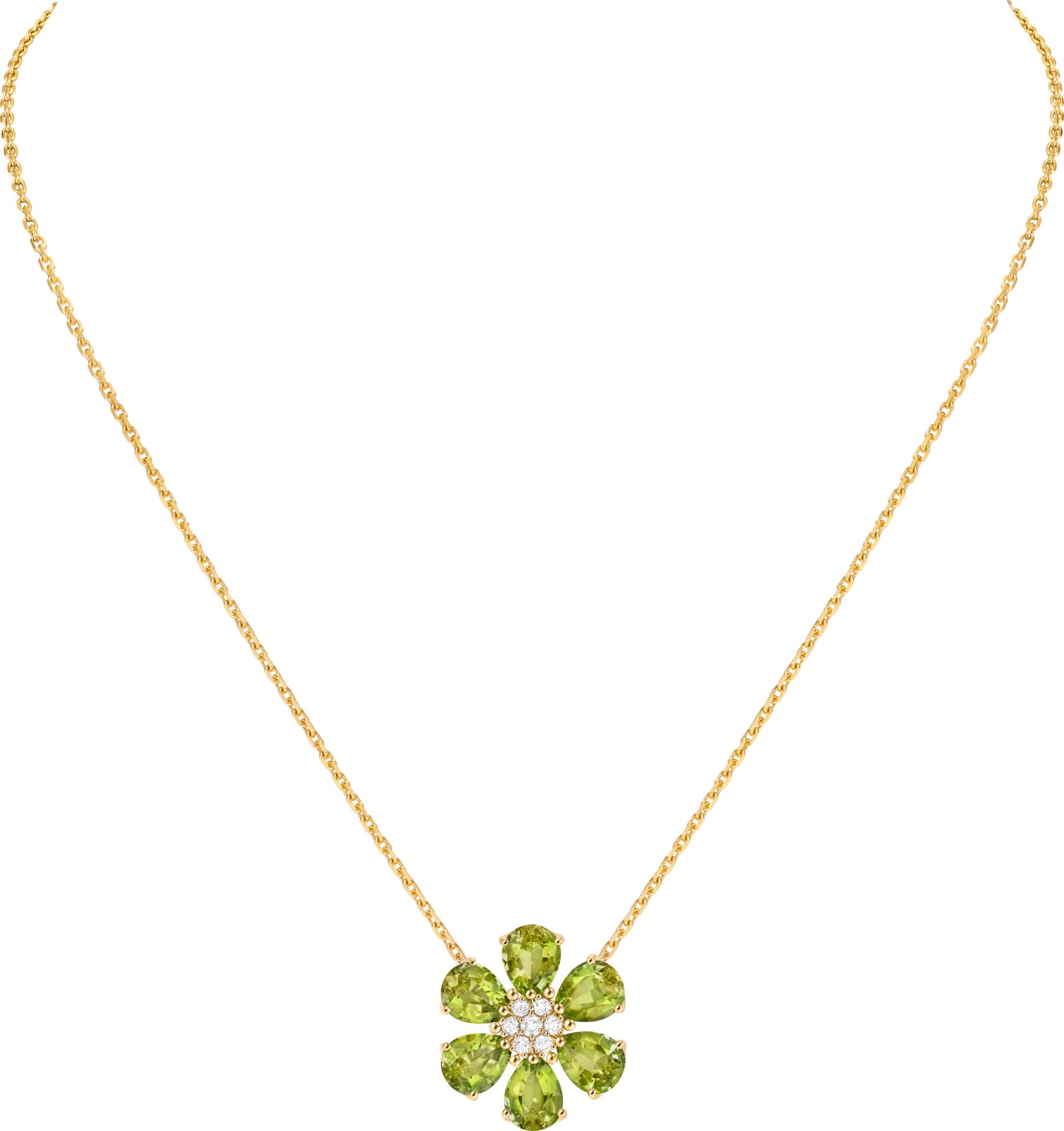 <p>Anhänger aus der Linie «Fleurs d’Hawaï» in Gelbgold mit Diamanten und Peridot. 15’800 Franken.</p>