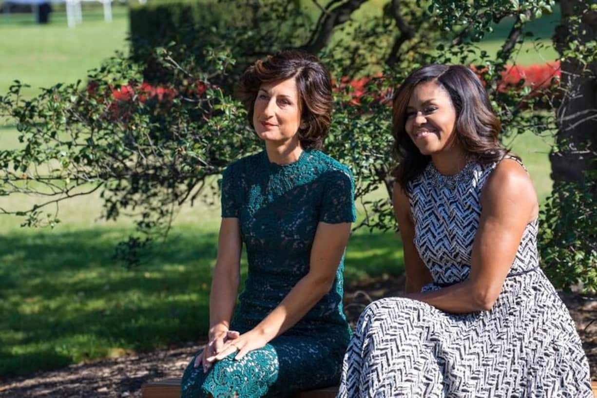 Next to the White House Kitchen Garden on the South Lawn in Washington, DC, USA, on October 18, 2016., (l-r), Mrs. Agnese Landini, and First Lady Michelle Obama, enjoy a performance by students from a local Turnaround Arts school program, as part of the spousal program for the Italy Official Visit.White House Kitchen Garden on the South Lawn in Washington, DC, USA, on October 18, 2016., (Photo by Cheriss May/NurPhoto via Getty Images)