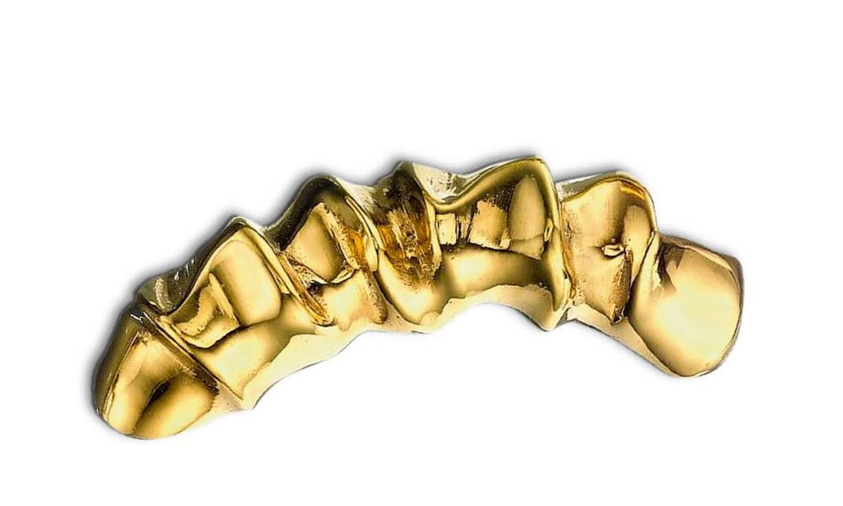 Annelise Michelson: Ohrmanschette aus Bronze, vergoldet. Rund 400 Fr.