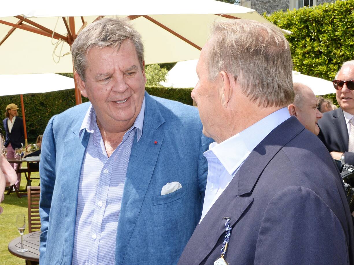 CHICHESTER, ENGLAND - JUNE 29:  Johann Rupert (L) and Paddy McNally attend the Cartier Style & Luxury Lunch at the Goodwood Festival of Speed on June 29, 2014 in Chichester, England.  (Photo by David M. Benett/Getty Images)