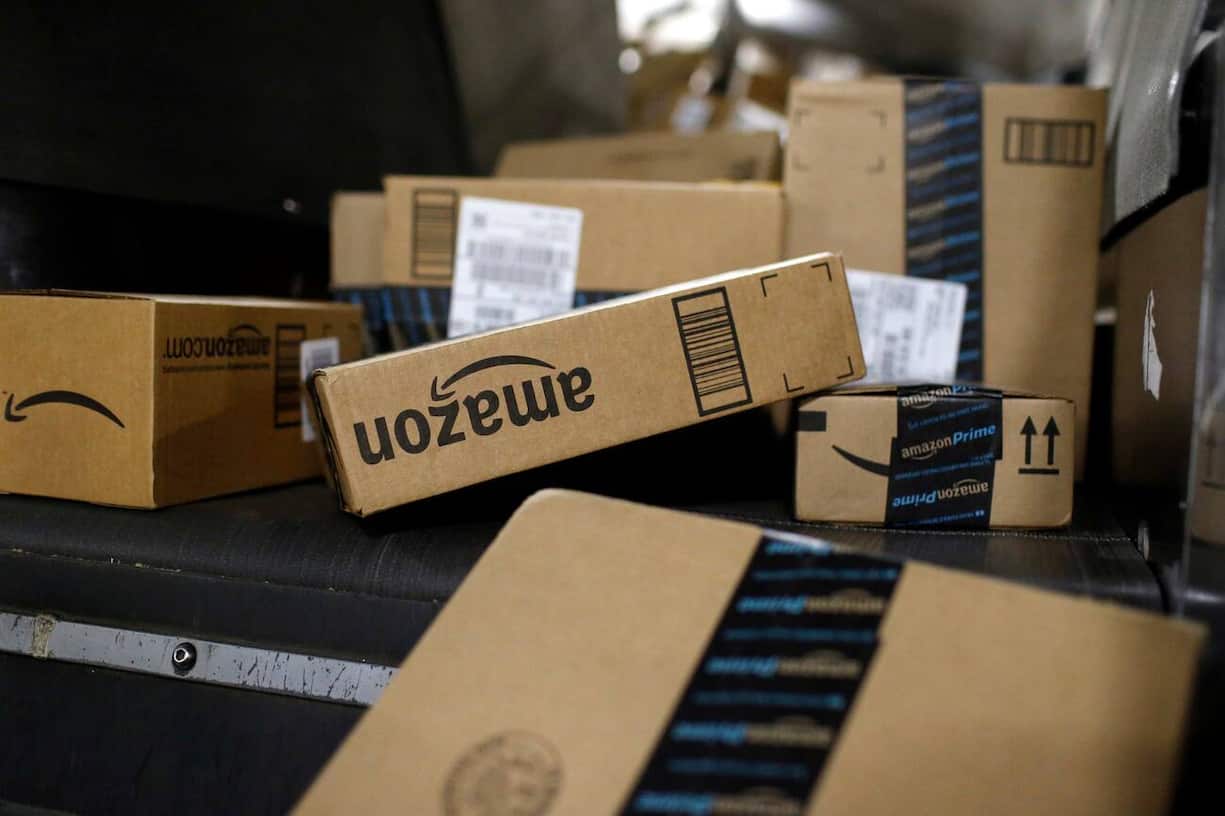 FILE - In this Nov. 20, 2015, photo, packages being shipped in Amazon boxes ride a conveyor belt at the UPS Worldport hub in Louisville, Ky. Amazon is already a huge part of many peopleâs lives. And its $13.7 billion deal for the organic grocer Whole Foods will likely bind its customers even more tightly. While Amazon is the clear leader in e-commerce, 90 percent of worldwide retail spending is still in brick-and-mortar stores, according to eMarketer. (KEYSTONE/AP Photo/Patrick Semansky)
