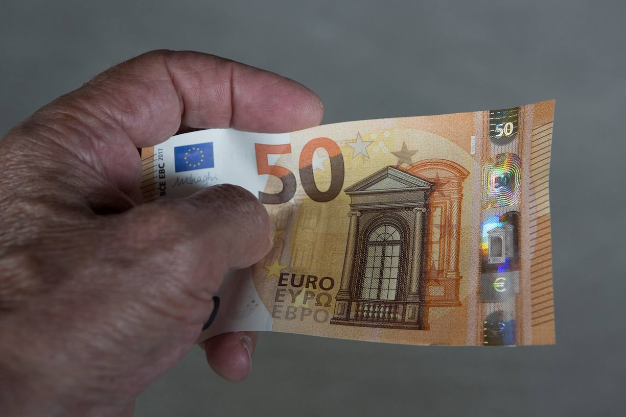 GERMANY, FRANKFURT - JULY 13: Feeling, seeing, titting-a number of important security features on the new 50 Euro banknotes which are circulated in the spring 2017th. The photo shows  the front side of the new banknote. (Photo by Ulrich Baumgarten via Getty Images)