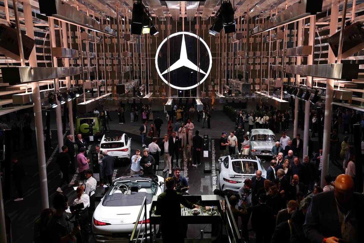 epa12360819 Visitors gather at the Mercedes pavilion during the world premiere of the GLC in Munich, Germany, 07 September 2025. The International Motor Show Germany IAA Mobility 2025 takes place in Munich from 09 to 14 September 2025, featuring numerous world premieres, and a special focus on electric mobility and digitization. EPA/ANNA SZILAGYI