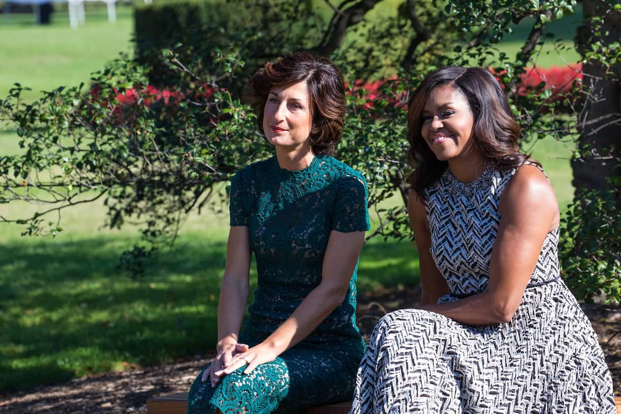 Next  to the White House Kitchen Garden on the South Lawn in Washington, DC, USA, on October 18, 2016., (l-r), Mrs. Agnese Landini, and First Lady Michelle Obama, enjoy a performance by students from a local Turnaround Arts school program, as part of the spousal program for the Italy Official Visit.White House Kitchen Garden on the South Lawn in Washington, DC, USA, on October 18, 2016.,   (Photo by Cheriss May/NurPhoto via Getty Images)