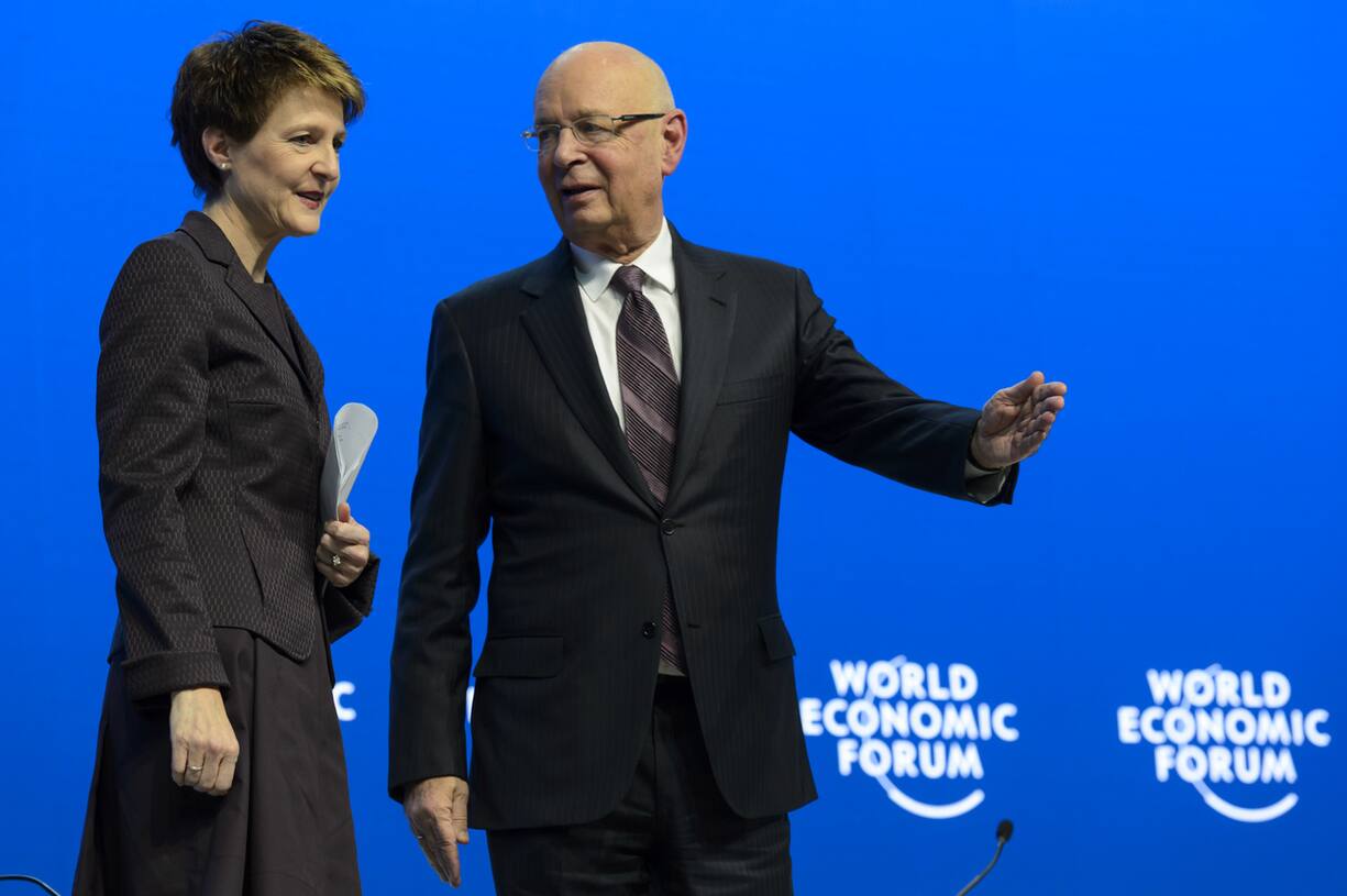Simonetta Sommaruga, left, speaks with German Klaus Schwab, right, founder and president of the World Economic Forum, WEF,during the opening  session on the first day of the 45th Annual Meeting of the World Economic Forum, WEF, in Davos, Switzerland, Wednesday, January 21, 2015. The overarching theme of the Meeting, which takes place from 21 to 24 January, is "The New Global Context". (KEYSTONE/Laurent Gillieron)