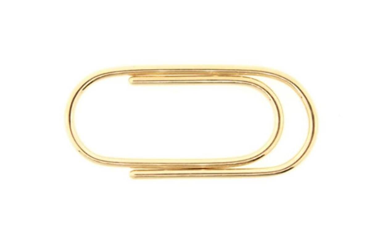 2010 Dollar – Geldklammer: 13,8 Gramm wiegt die schlichte Geldklammer von Tiffany & Co., die einer Papierklammer nachempfunden ist. Dieses Objekt ist mit bereits 55 Geboten das derzeit mit Abstand beliebteste.