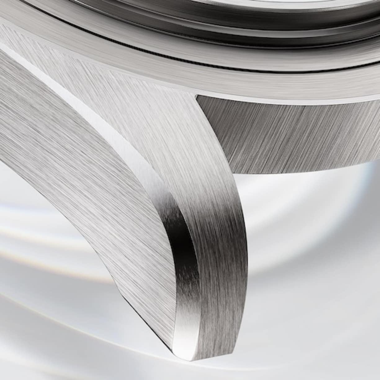 Rolex verwendet mit Titan RLX eine spezielle Legierung von Titan Grade 5, bei der Aluminium und Vanadium beigemischt sind.