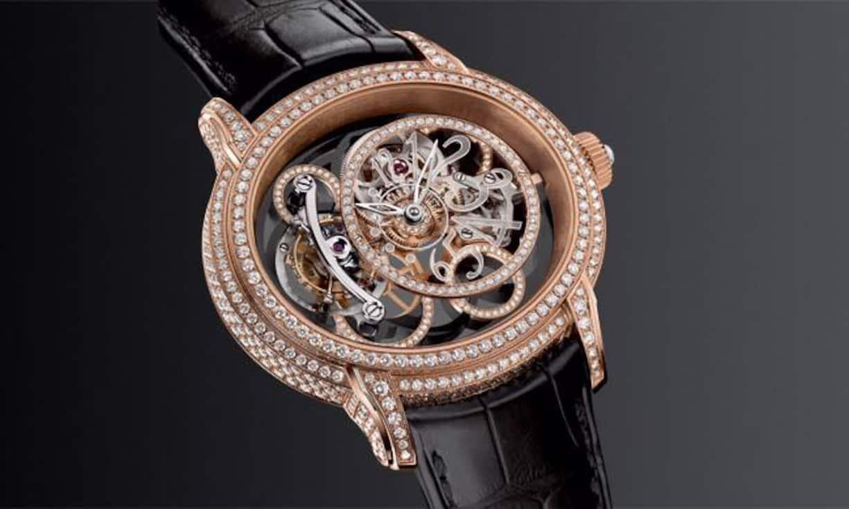 Jahrtausenduhr: Audemars Piguet Millenary Calcédoine im Roségoldgehäuse mit 345 Diamanten (3,45 Karat) und einem skelettierten Werk mit Tourbillon auf der transparenten Platine.