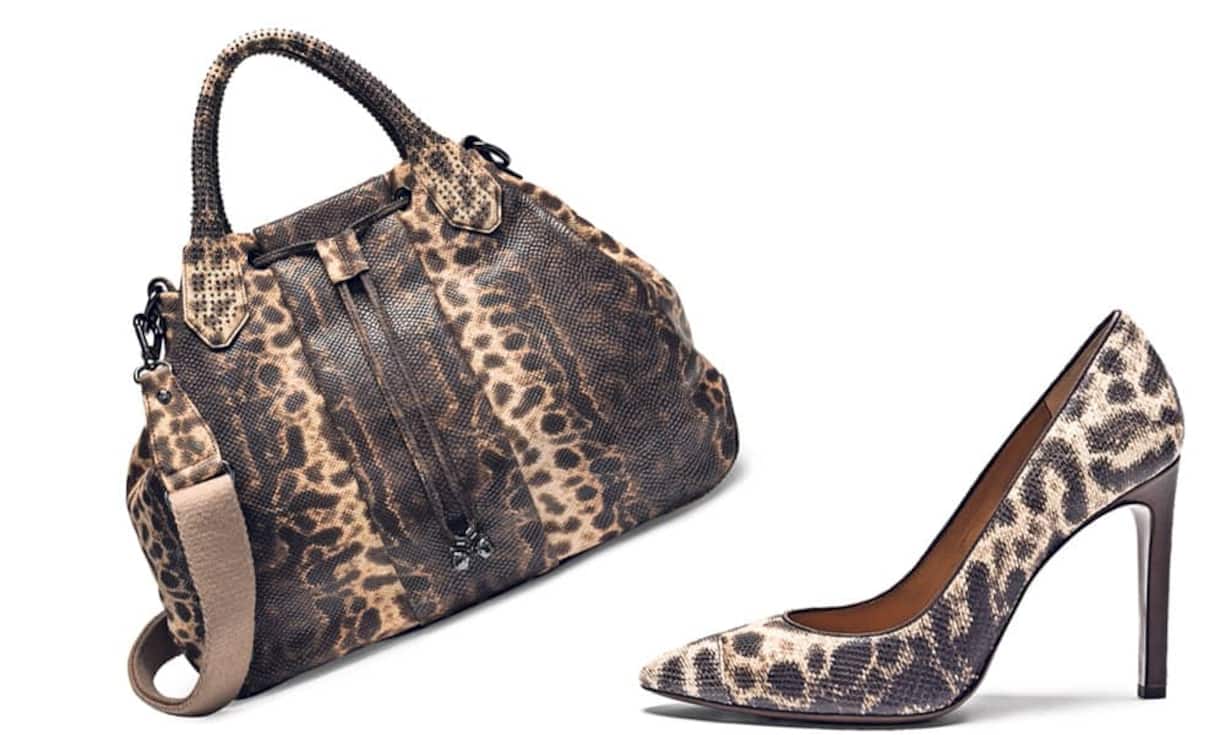Navyboot Leo-Print liegt im Trend. Kombiniert mit einem einfarbigen Business-Look sticht diese Tasche aus Kalbsleder von Navyboot besonders heraus. Dazu gibt es die passenden Pumps in Leo-Optik. Preis: Tasche 890 Franken, Schuhe 349 Franken