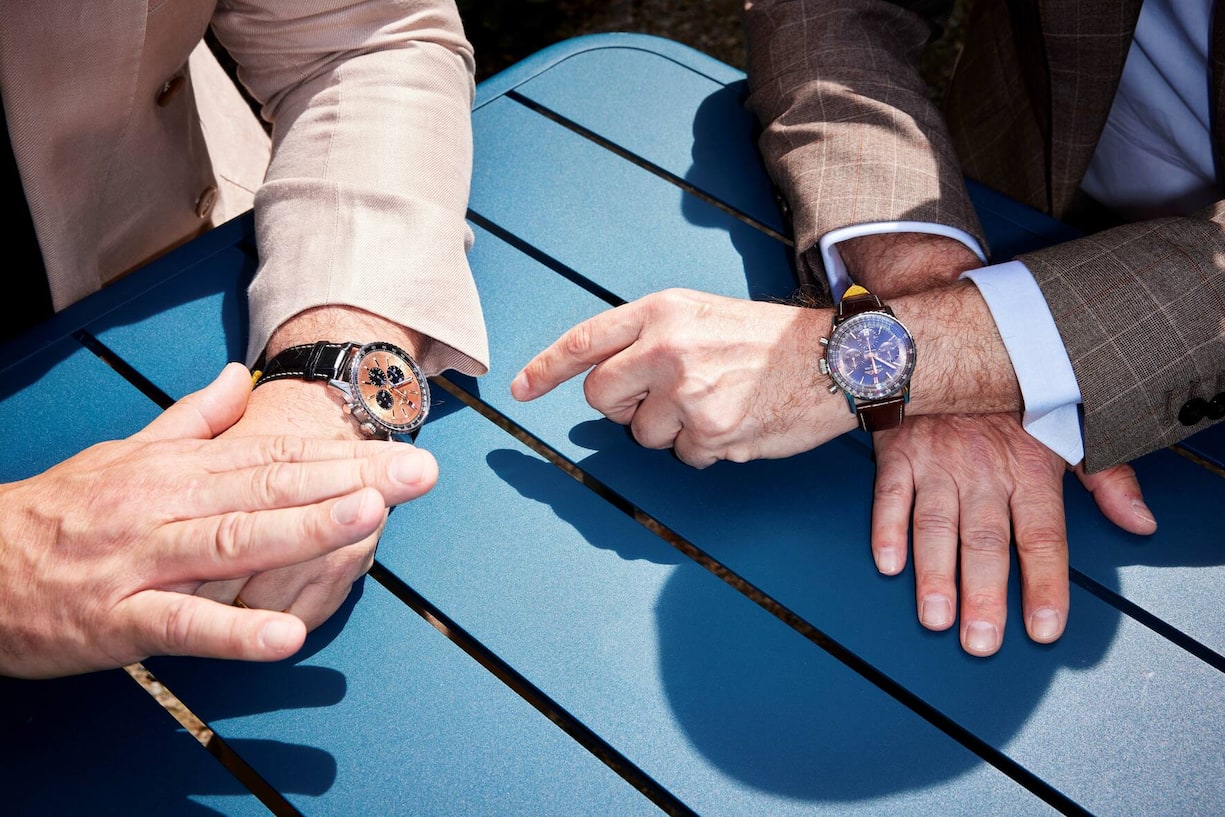 Präsident und CEO mit dem Breitling-Parademodell Navitimer.