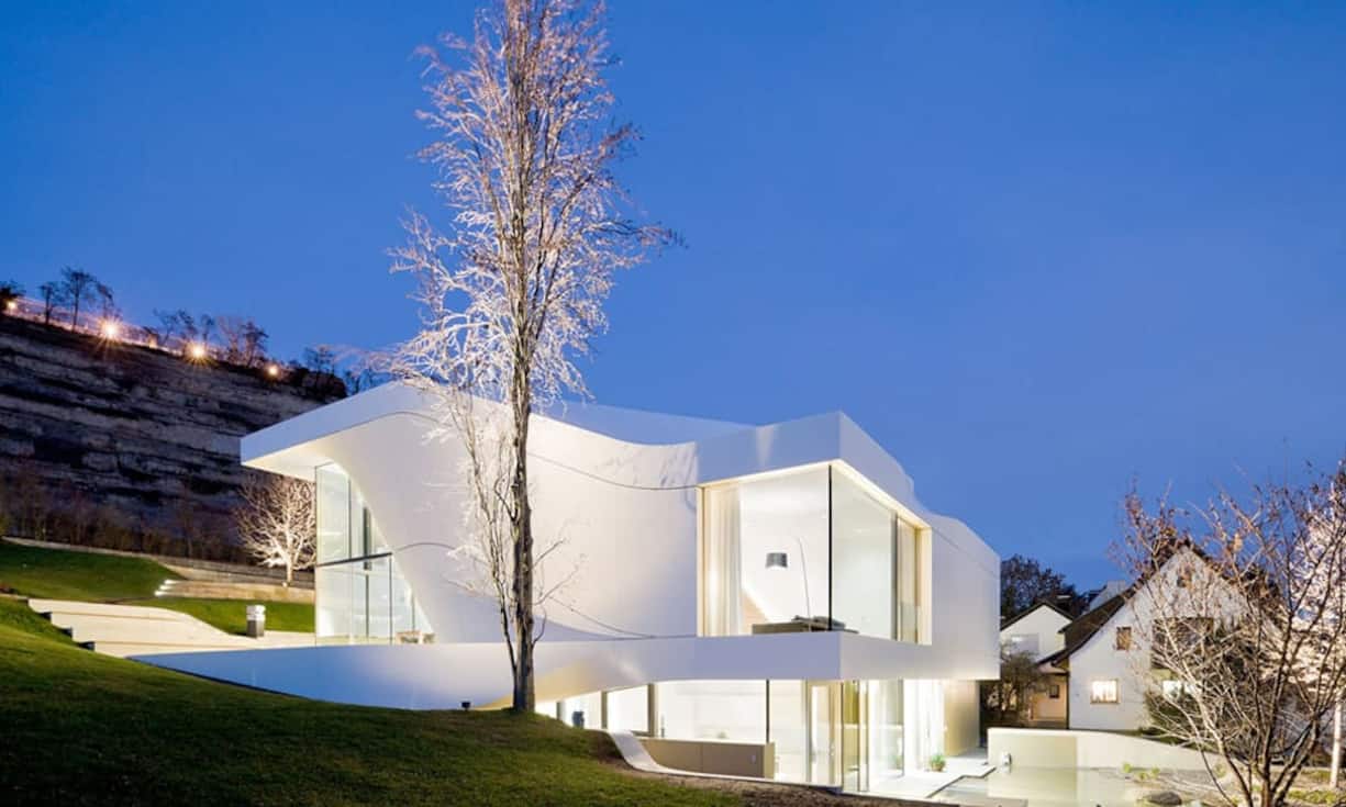 … den Bewohnern dank grossen Fensterflächen eine wunderbare Aussicht auf die hügelige Landschaft rund um die…