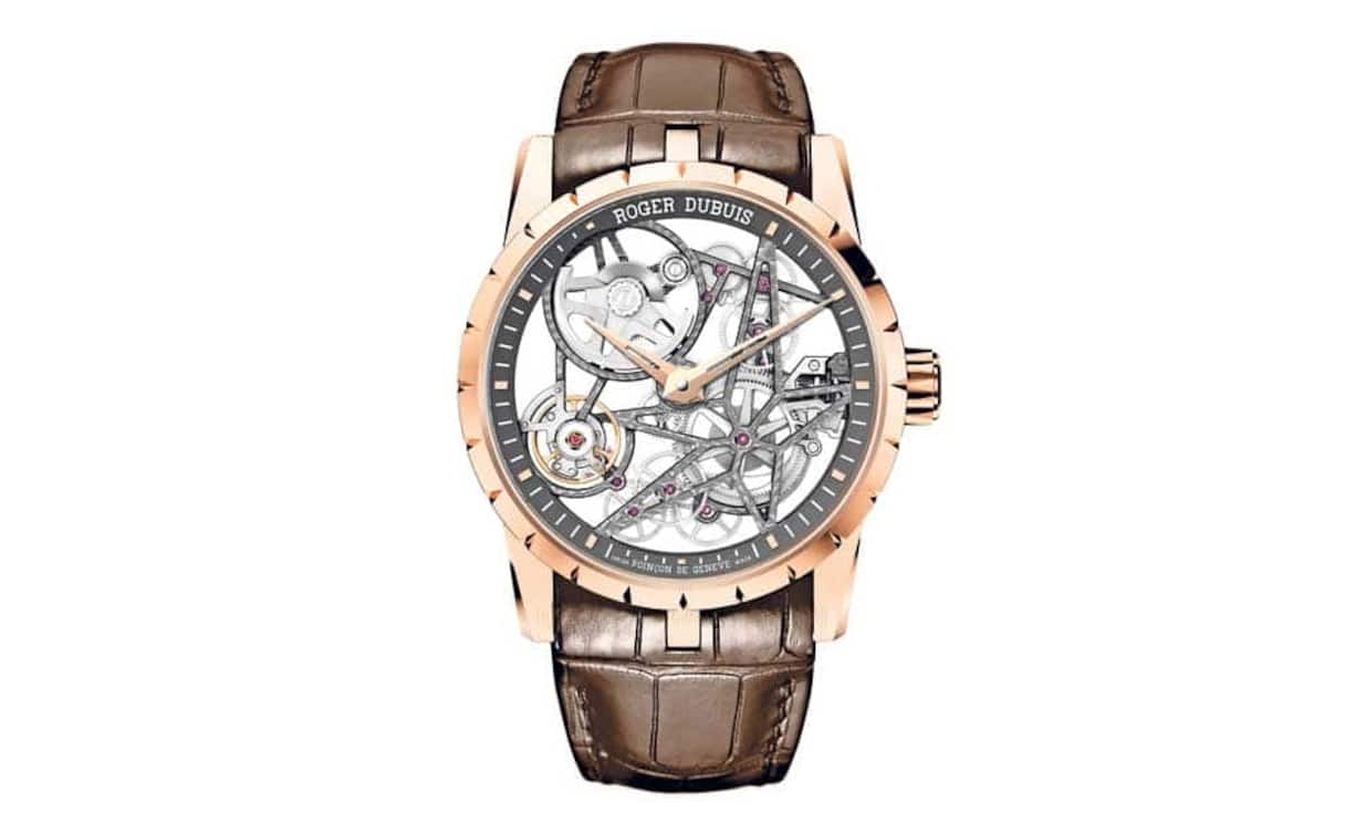 Roger Dubuis - Voll transparent
Excalibur Automatique Squelette: 2015 wird bei der Genfer Manufaktur alles schlanker - und transparent. In diesem Miniatur-Meisterwerk fürs Handgelenk sind sämtliche Flächen der 167 Bestandteile des automatischen Skelettkaliber individuell bearbeitet. Gehäse und Lünette vermitteln einen spektakulären 3D-Effekt. Grösse: 42 Millimeter / Gehäuse: Roségold