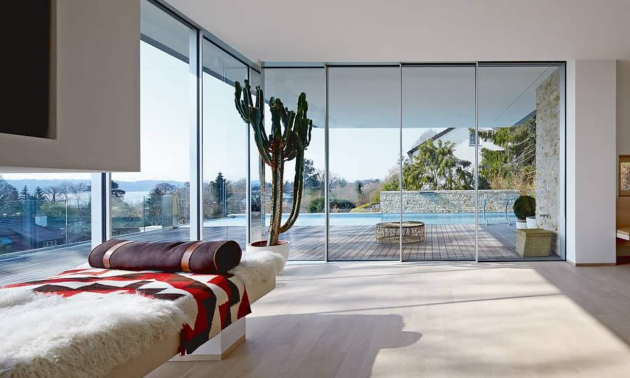 Wenn Natur, Häuser und Menschen zu einer höheren Einheit zusammenwachsen: Sky-Frame-Fassade in Winkel (ZH)...