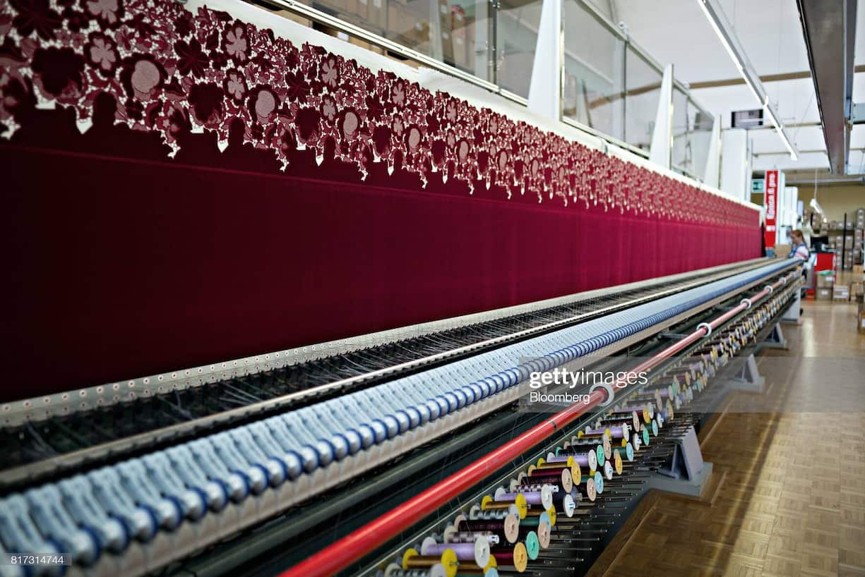 An embroidery machine, manufactured by Saurer AG, embroiders a textile in the stitching hall at the Forster Rohner AG textile production workshop in St Gallen, Switzerland, on Wednesday, May 31, 2017. Forster Rohner, a 113-year-old company in the eastern city of St. Gallen, produces fabric that can cost thousands of dollars per yardincluding material used in the dress that British socialite Pippa Middleton wore at her wedding in May. Photographer: Michele Limina/Bloomberg via Getty Images