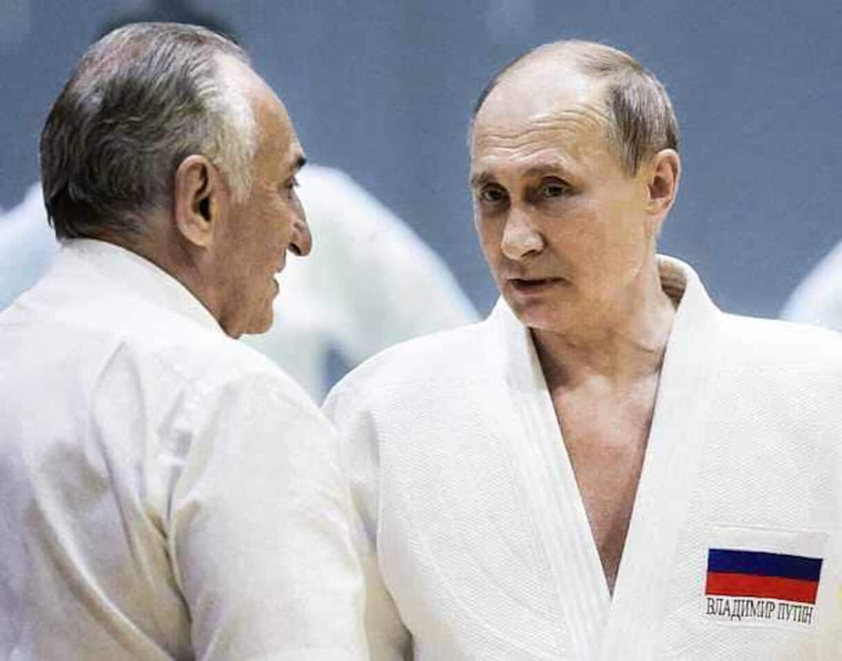 SOCHI, RUSSIA - FEBRUARY, 14 (RUSSIA OUT) Russian businessman and billionaire Vasily Anisimov (L) listens to President Vladimir Putin (R) during judo trainings at Yug Sport complex in Sochi, Russia, February,14,2019. Russian President Putin has arrived to Sochi to meet with Belarussian, Turkish and Iranian Presidents. (Photo by Mikhail Svetlov/Getty Images)