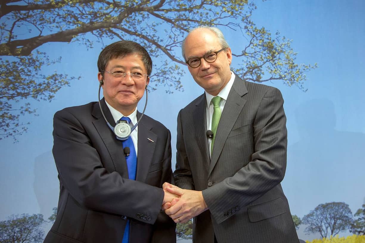 Ren Jianxin und Michel Demaré von Syngenta