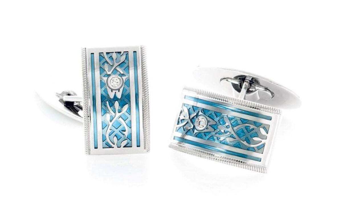 Wellendorff - EwigDiese raffiniert verzierten Manschettenknöpfe aus 18 Karat Weissgold, Kaltemaille und Brillanten schmücken jedes Hemd auf luxuriöse Weise. Preis 8820 Franken Keystone