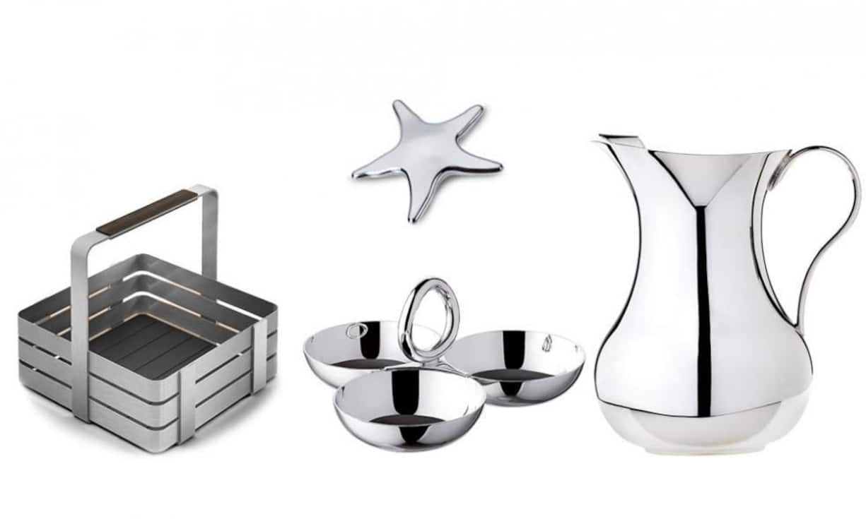 Die elegante Wasserkaraffe und die Schälchen aus Silber von Christofle verleihen der Sommertafel eine glanzvolle Note. Der formschöne Utensilien-/Besteckkorb aus Edelstahl von Carl Mertens, Solingen, sorgt für einen strahlenden Tag. Ein praktisches Zubehör ist der Serviettenhalter aus Cromargan ® Edelstahl von WMF. Mit dem Beschwerer für die Platzkärtchen von AdHoc bleibt alles auch bei einer erfrischenden Windböe an seinem Platz. www.christofle.com, www.wmf.de und www.adhoc-design.de