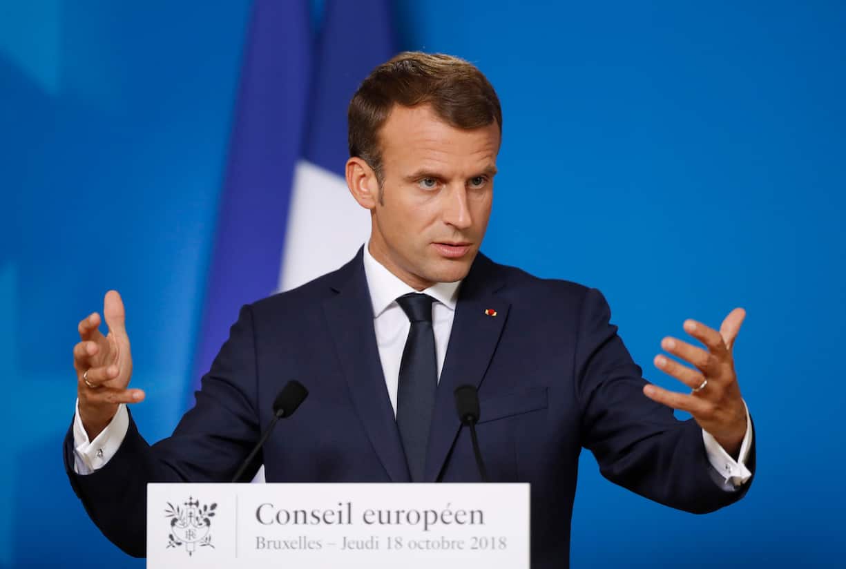 French President Emmanuel Macron speaks during a media conference at an EU summit in Brussels, Thursday, Oct. 18, 2018. EU leaders met for a second day on Thursday to discuss migration, cybersecurity and to try and move ahead on stalled Brexit talks. (AP Photo/Alastair Grant)