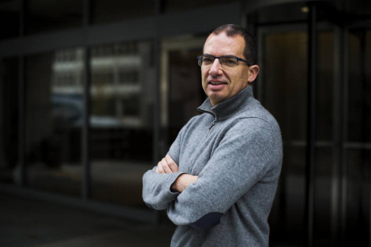 Stephane Bancel, chief executive officer of Moderna Therapeutics Inc., stands for a photograph at the company's office in Cambridge, Massachusetts, U.S., on Tuesday, Nov. 14, 2017. Moderna this week started testing a personalized treatment that teaches the body how to fight cancer. Photographer: Adam Glanzman/Bloomberg via Getty Images