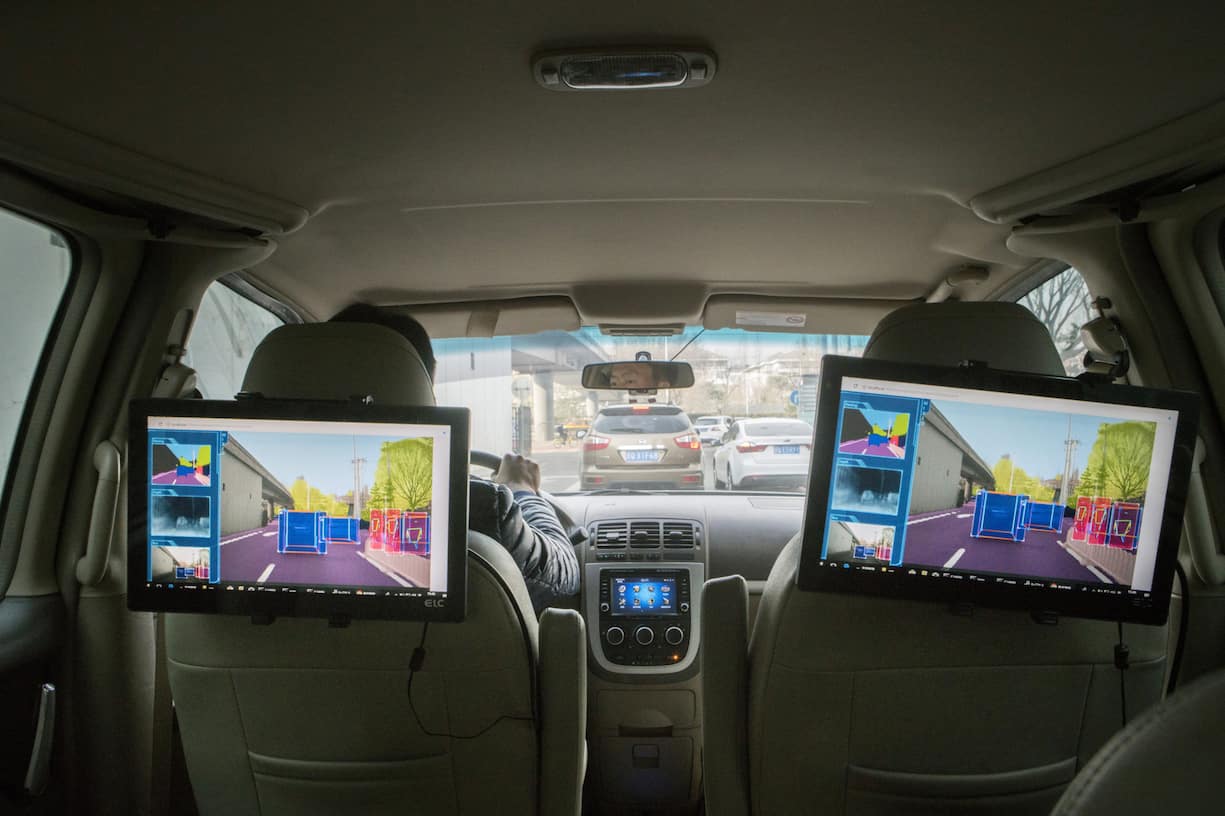 Screens show a demonstration of the cognition level of Horizon Robotics Inc.'s Journey processor onboard a vehicle during a test drive in Beijing, China, on Friday, March 23, 2018. China's aspiration to deploy 30 million autonomous vehicles within a decade is seeding a fledgling chip industry, with startups like Horizon Robotics emerging to build the brains behind those wheels. Photographer: Giulia Marchi/Bloomberg