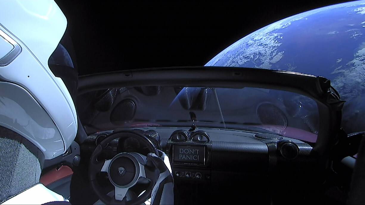 Starman is pictured in the driver s seat of SpaceX CEO Elon Musk s Tesla Roadster as it travels through space towards Mars