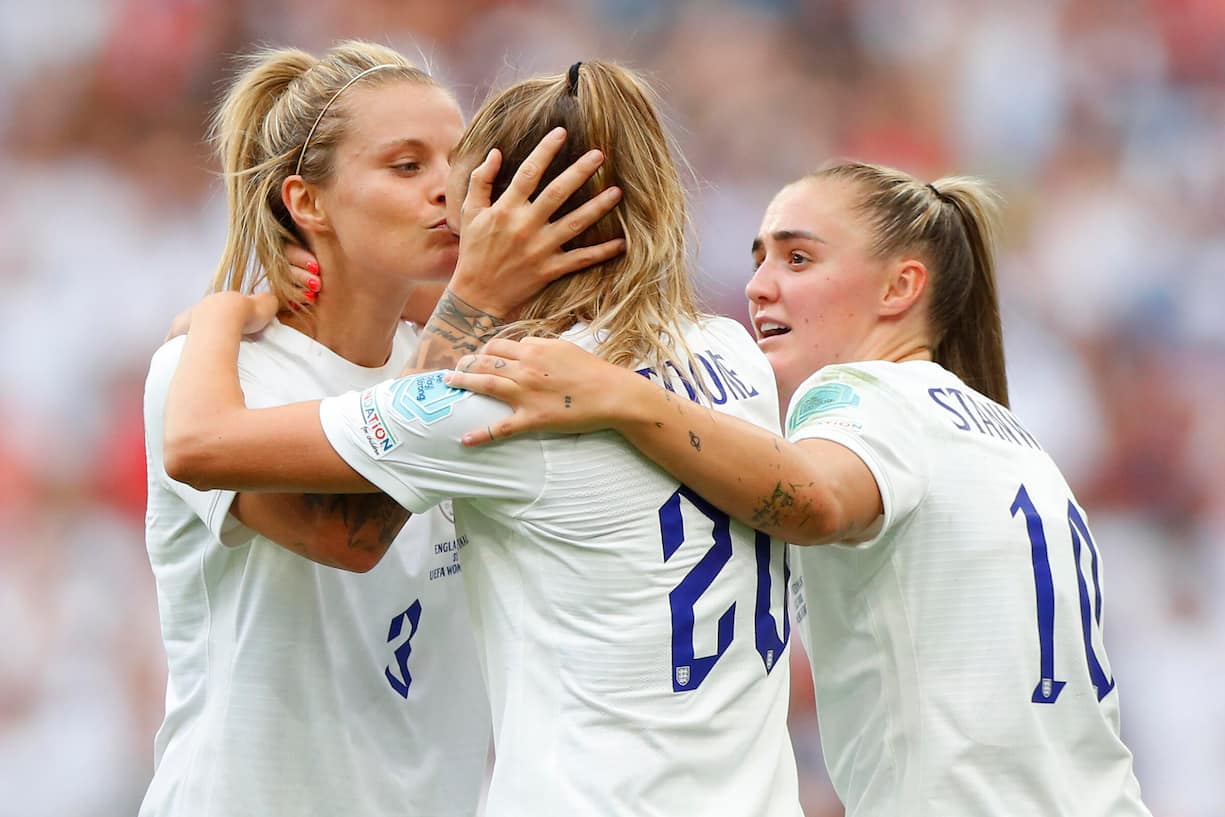LONDON, ENGLAND - JULY 31: Ella Toone of England celebrates with teammates Rachel Daly and Georgia Stanway after scoring their team's first goal during the UEFA Women's Euro 2022 final match between England and Germany at Wembley Stadium on July 31, 2022 in London, England. (Photo by Lynne Cameron - The FA/The FA via Getty Images)
