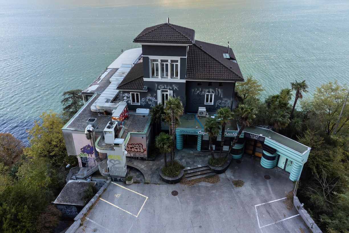 Aerial view of Capo San Martino, a prestigious building overlooking Lake Ceresio, now in a state of neglect but with a redevelopment project by architect and FC Sion president Christian Constantin, in Paradiso, Switzerland, Sunday, October 26, 2025. (KEYSTONE/Ti-Press/Massimo Piccoli)