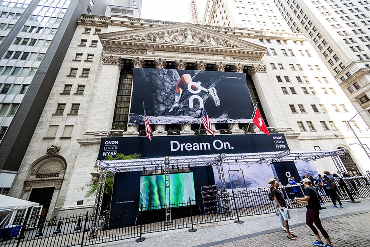 The facade of the New York Stock Exchange is decorated for the initial public offering of On Holdings, the sneaker manufacturer, on Wednesday, September 15, 2021. Roger Federer is reported to be an investor in the company. (Ă© Richard B. Levine)