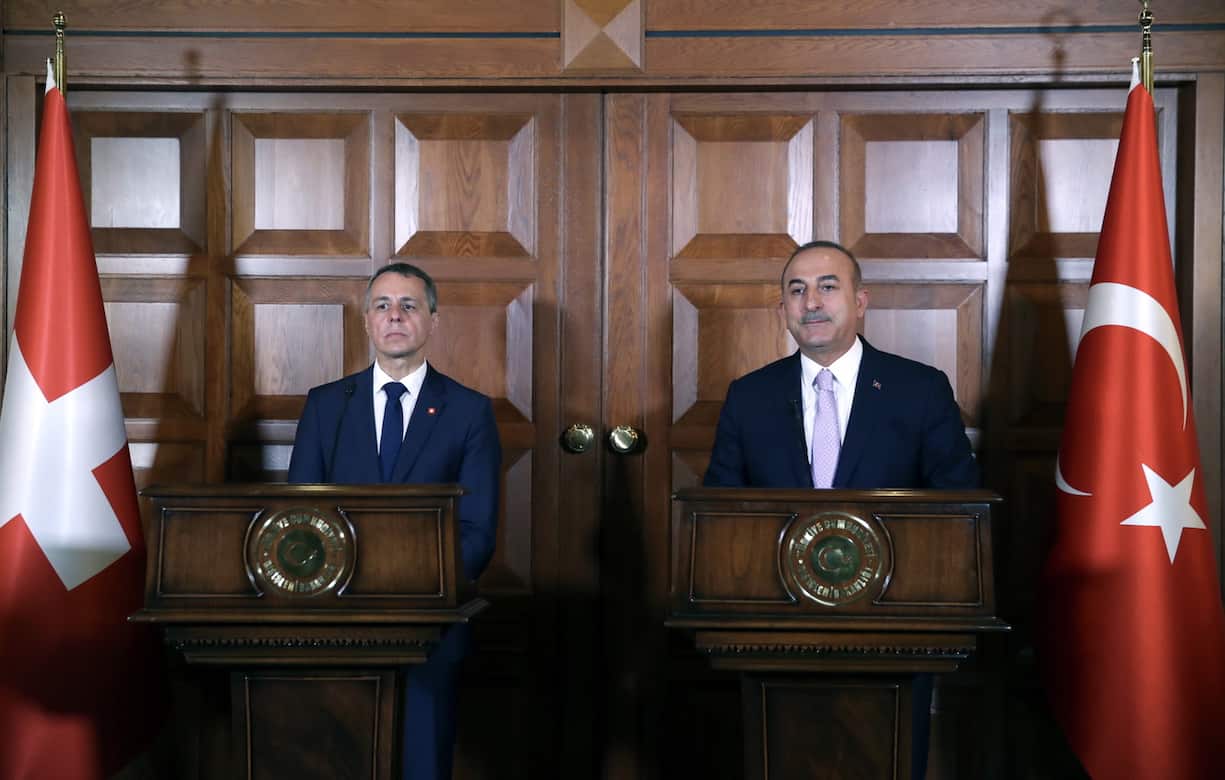 epa07711799 A handout photo made available by the Turkish Foreign Ministry press office shows Turkish Foreign Minister Mevlut Cavusoglu (R) and Swiss Foreign Minister Ignazio Cassis (L) speaking during a press conference after their meeting in Ankara, Turkey, 12 July 2019. EPA/CEM OZDEL HANDOUT HANDOUT EDITORIAL USE ONLY/NO SALES