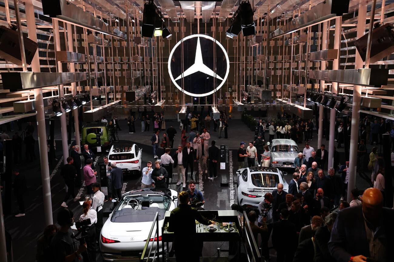 epa12360819 Visitors gather at the Mercedes pavilion during the world premiere of the GLC in Munich, Germany, 07 September 2025. The International Motor Show Germany IAA Mobility 2025 takes place in Munich from 09 to 14 September 2025, featuring numerous world premieres, and a special focus on electric mobility and digitization. EPA/ANNA SZILAGYI