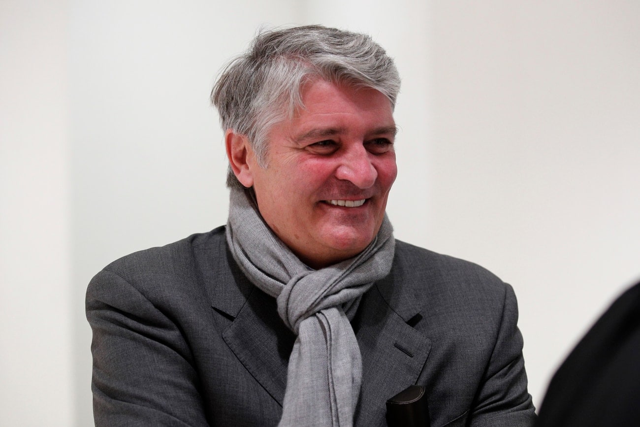 Former CEO of Global Wealth Management and Business Banking at UBS AG Raoul Weil shares a laugh with his lawyer during a break of the Swiss bank's trial at the Paris courthouse in Paris, Wednesday, Nov. 14, 2018. Swiss bank UBS AG stand trial in France for allegedly helping wealthy French clients evade the country's tax authorities. (AP Photo/Francois Mori)