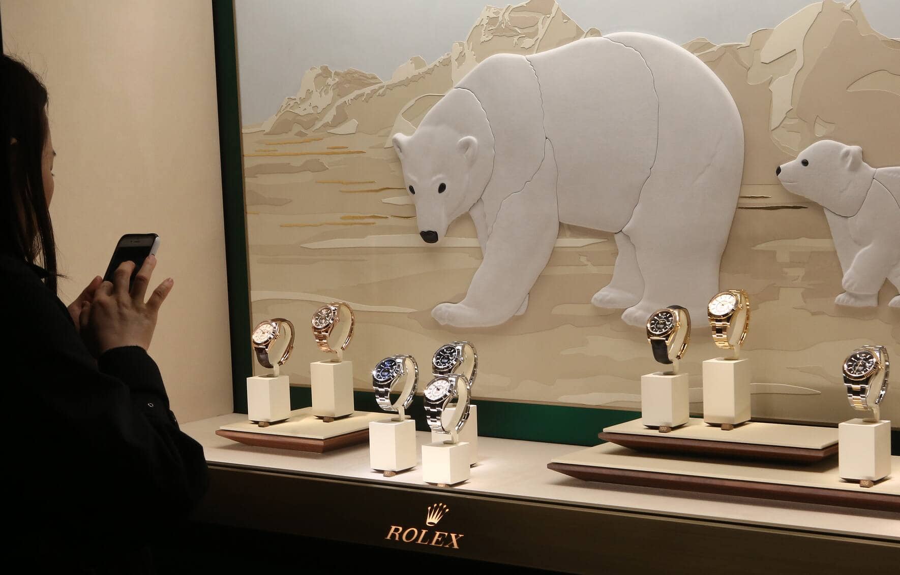 BASEL, SWITZERLAND - MARCH 21: A visitor photographs Rolex watches on the opening day of the 2019 Baselworld luxury watch and jewelry fair on March 21, 2019 in Basel, Switzerland. The Baselworld trade show runs from March 21-26. (Photo by Adam Berry/Getty Images)