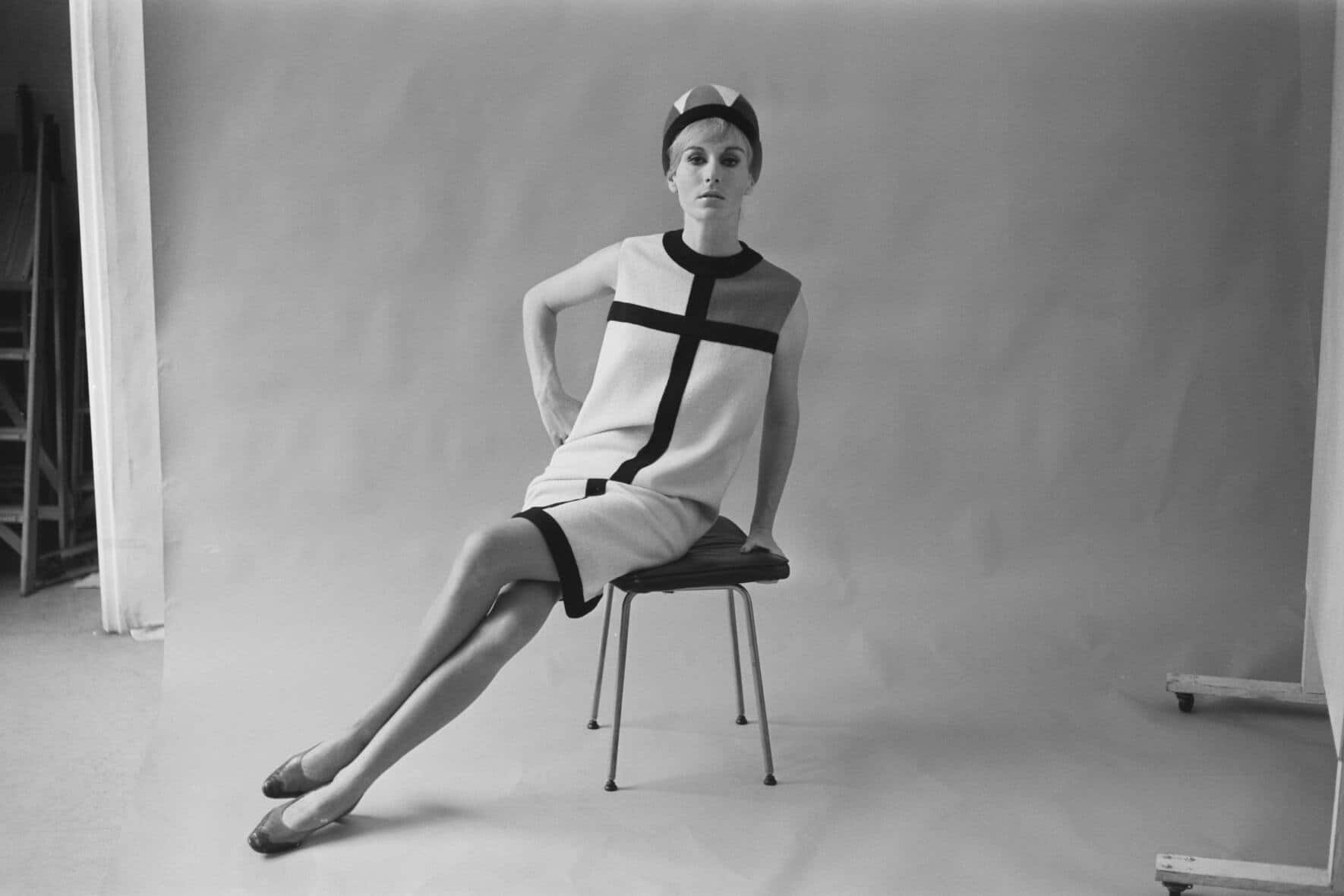 A model wearing a day dress from the Mondrian collection of French fashion designer Yves Saint Laurent, 23rd August 1965. The collection was inspired by the paintings of Piet Mondrian. (Photo by Terry Fincher/Express/Hulton Archive/Getty Images)