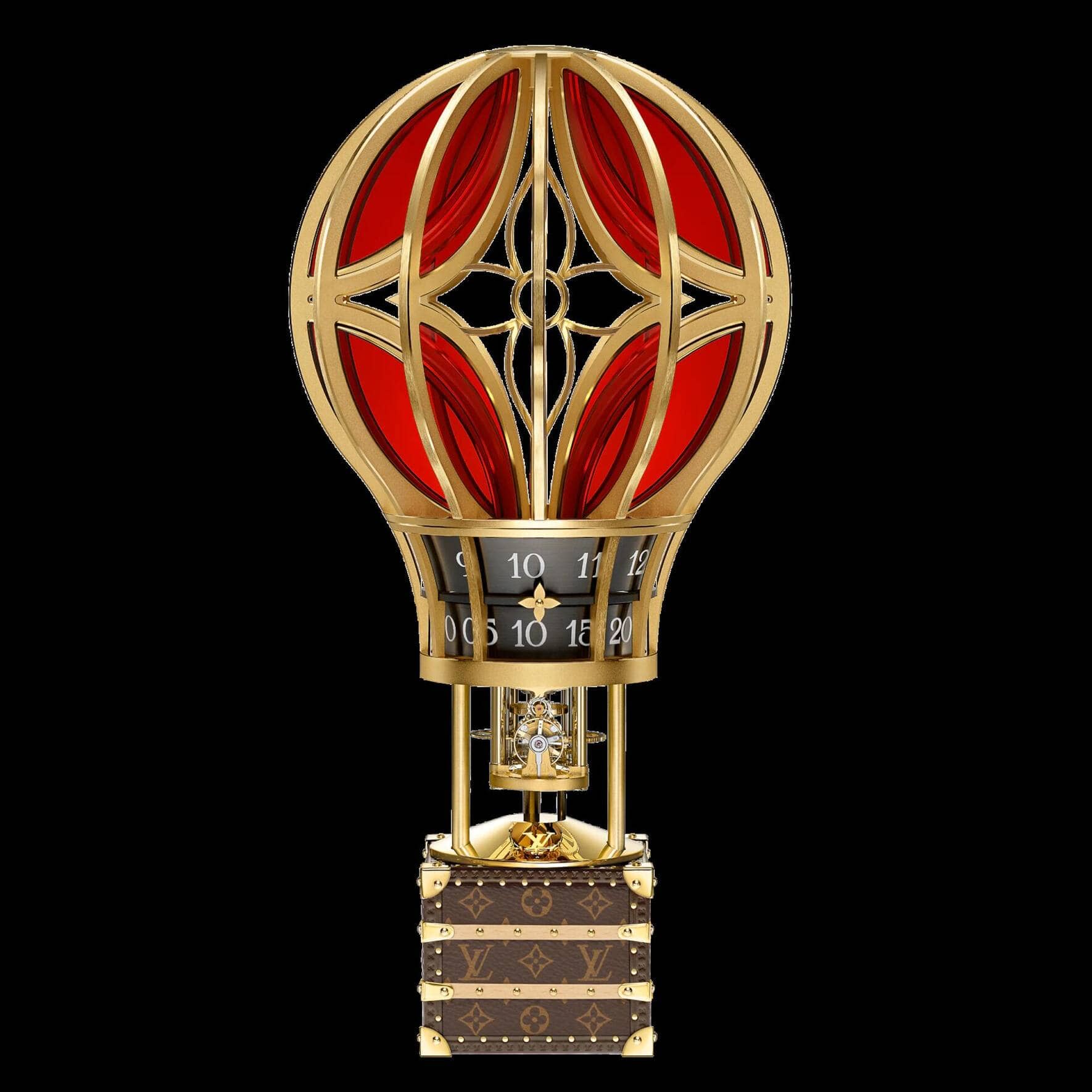 Tischuhr Montgolfière Aéro: Ein Heissluftballon transportiert den kleinsten jemals von Louis Vuitton gestalteten Koffer, in dem ein mechanisches Uhrwerk arbeitet.