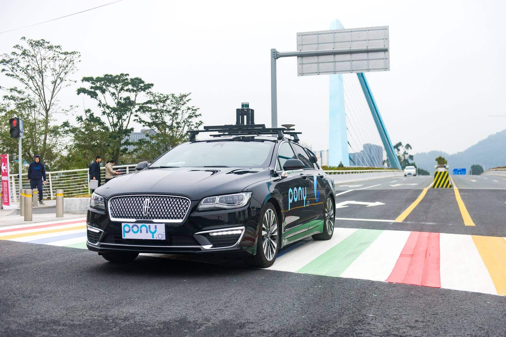 GUANGZHOU, CHINA - FEBRUARY 02:  Pony.ai self-driving cars run along a road during a trial run on February 2, 2018 in Guangzhou, China. Pony.ai, a year-old California-based self-driving car startup, will set up a fleet of self-driving cars to serve the public in Guangzhou.  (Photo by Liao Shupei/China News Service/VCG via Getty Images)
