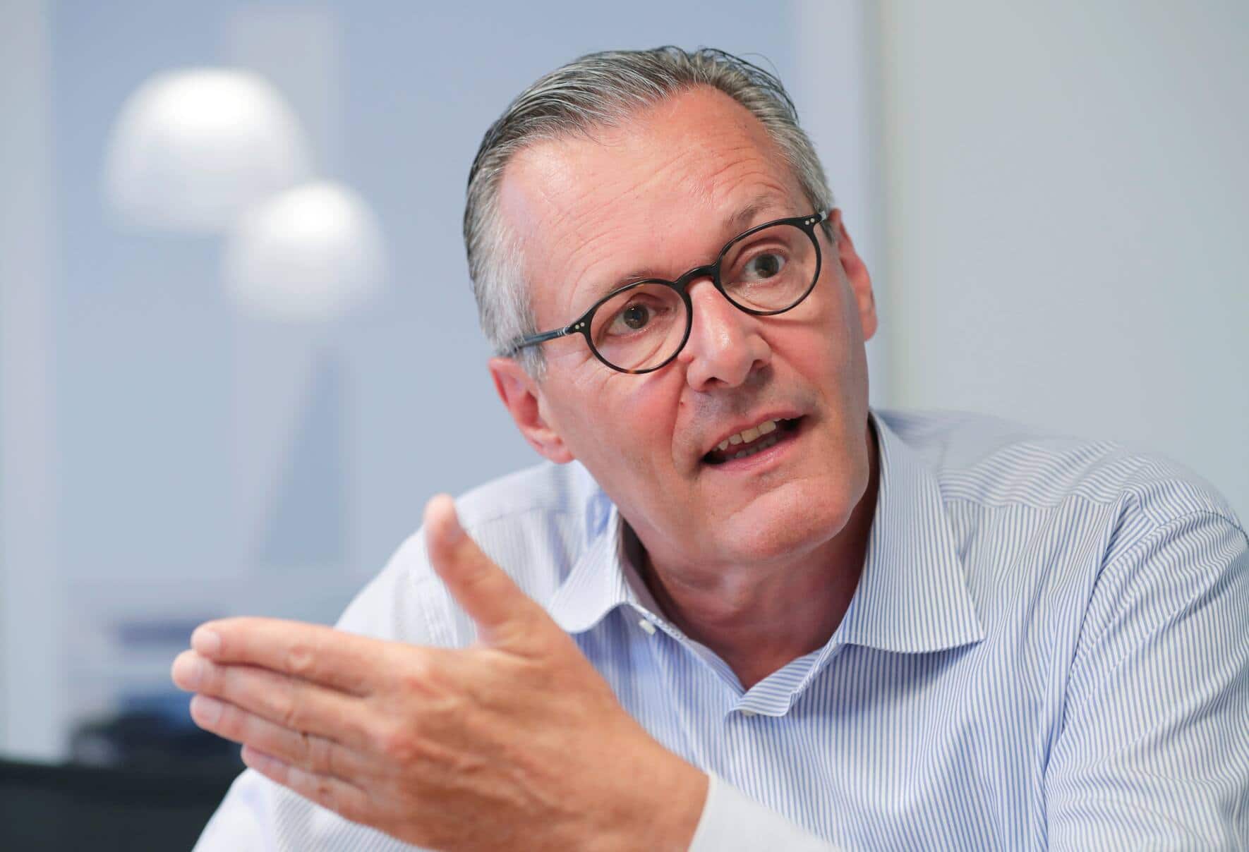 Paul Haelg, chairman of the board of the Swiss chemical group Sika, speaks during an interview with Reuters in Baar, Switzerland, June 8, 2018. REUTERS/Moritz Hager - RC1119C21240