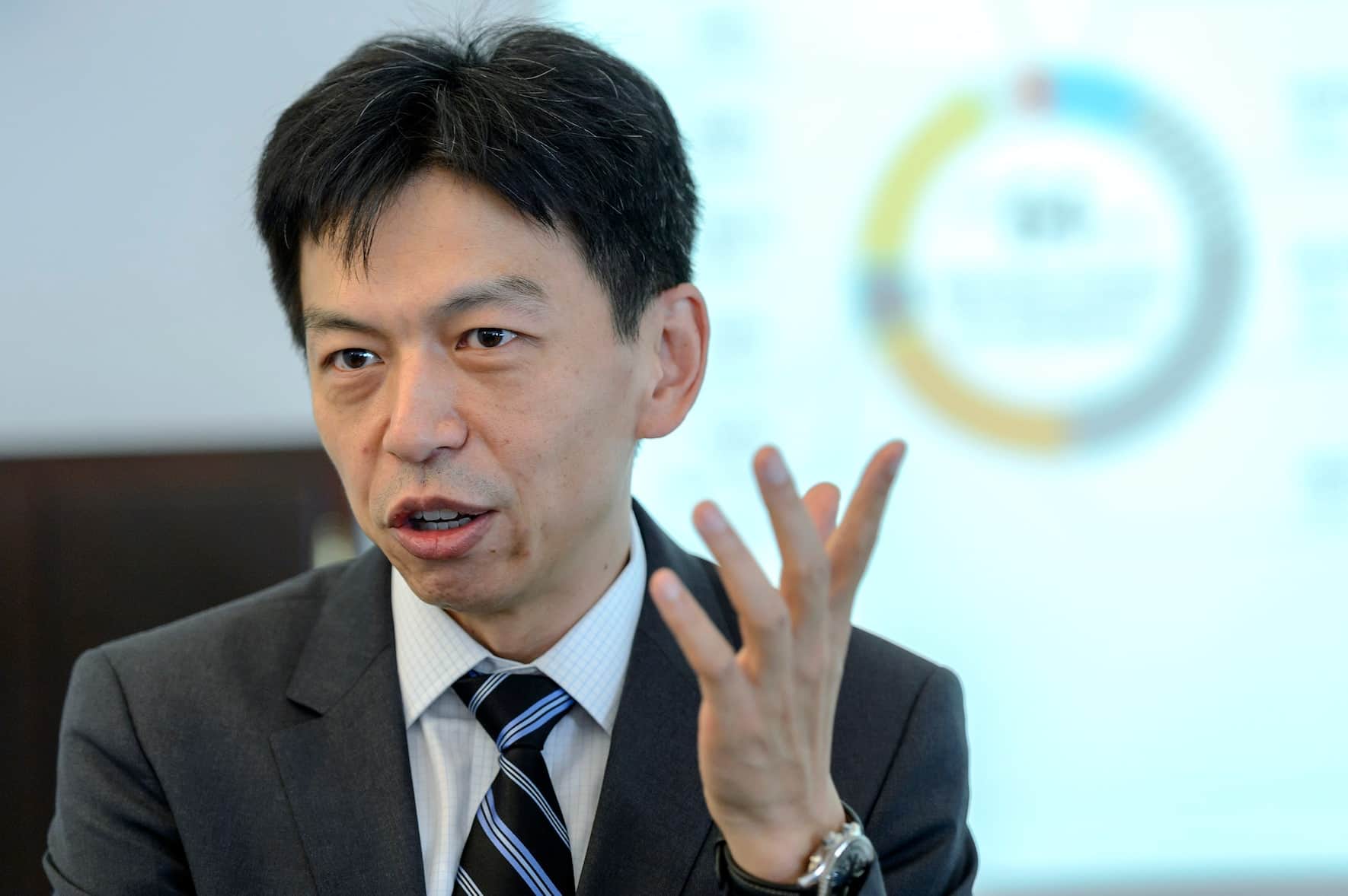 Swiss and Chinese Frankie Ng, CEO of the Societe Generale de Surveillance Group SGS, presents the 2015 Half Year results of SGS, the world's leading inspection, verification, testing and certification company, during a press conference at the SGS Corporate Headquarters, in Geneva, Switzerland, Friday, July 17, 2015. (KEYSTONE/Martial Trezzini)