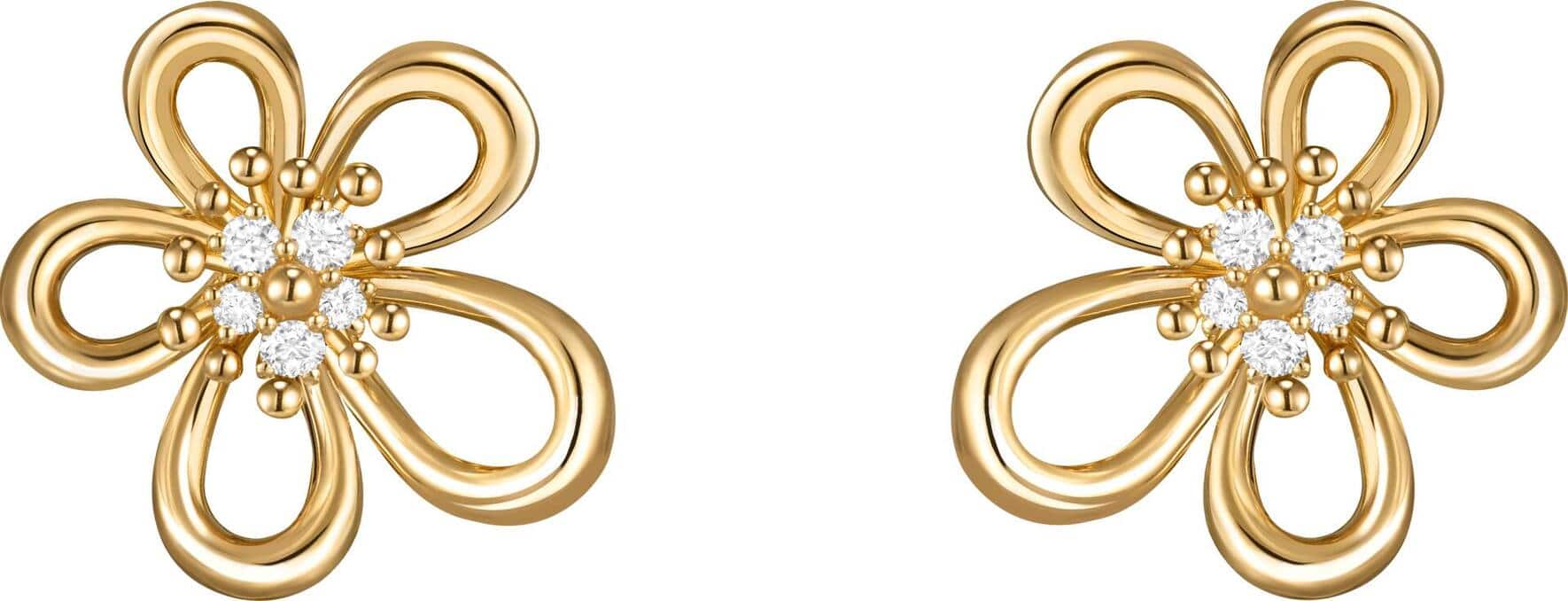 Die Blütenform der Ohrringe erinnert mit ihren geschwungenen Linien an fliessende Schleifen aus der Couture. 11’700 Franken.