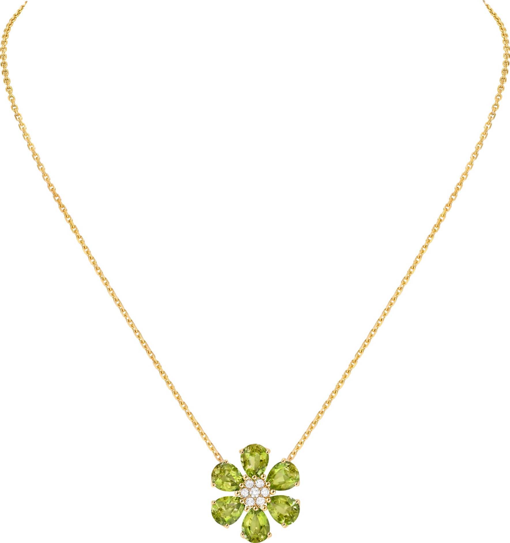 Anhänger aus der Linie «Fleurs d’Hawaï» in Gelbgold mit Diamanten und Peridot. 15’800 Franken.