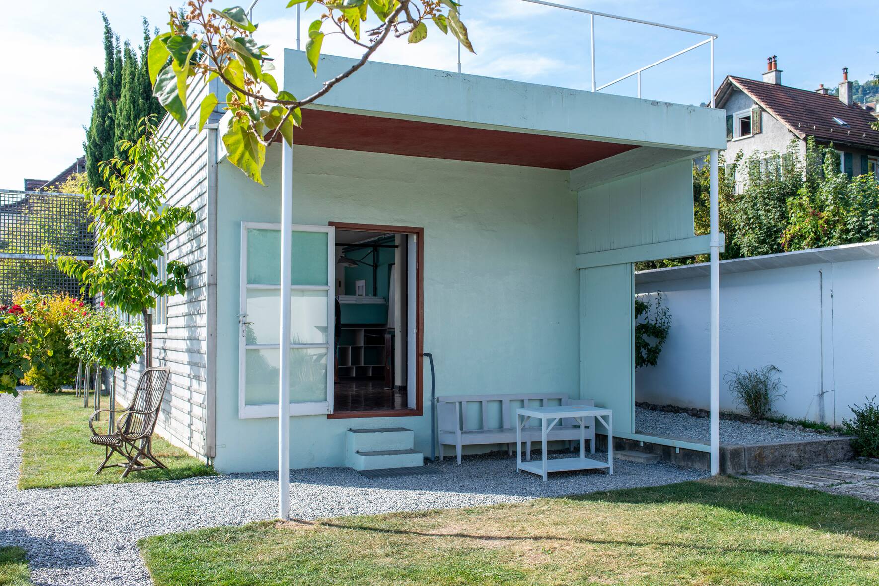View of exterior showing piloti. Villa Le Lac, Corseaux, Switzerland. Architect: Le Corbusier & Pierre Jeanneret, 1924. Villa Le Lac, Corseaux, Switzerland. Architect: Le Corbusier & Pierre Jeanneret, 1924.. (KEYSTONE/VIEW/Grant Smith)