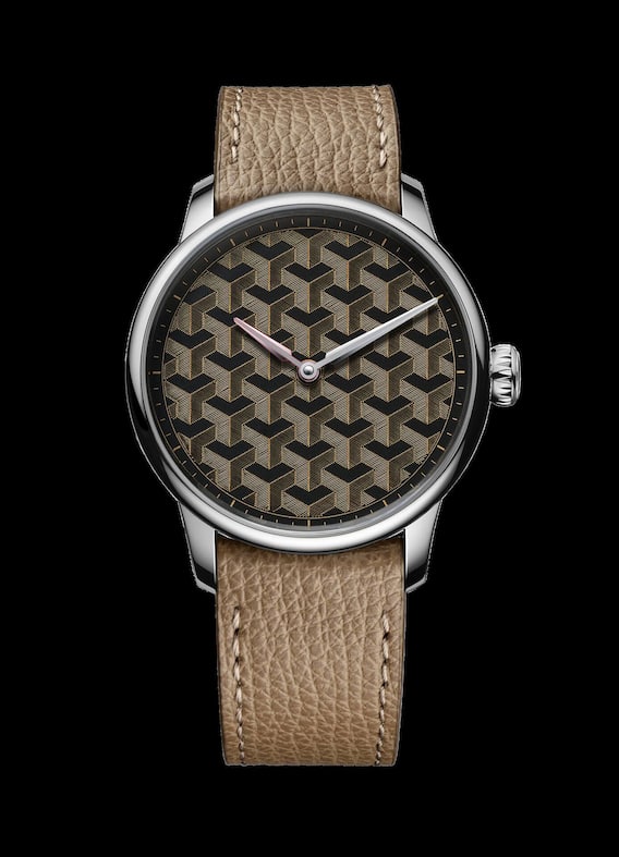 Ein geometrisches Muster aus feinen Golddrähten im Stil des niederländischen Künstlers Maurits Cornelis Escher ziert das Zifferblatt der Uhr Fil d’Or von Louis Erard.