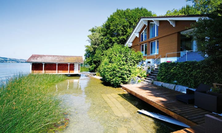Privilegiertes Wohnen am Ufer mit eigenem Bootshaus und…