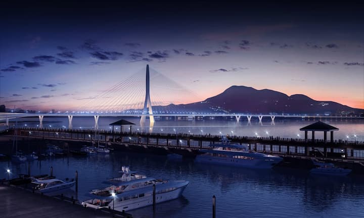 Danjiang Bridge von Zaha Hadid Architects, in Arbeit (Taipeh, Taiwan)Die Danjian Brücke erstreckt sich über 920 Meter und ist damit laut des Architekturbüros die längste asymmetrische Schrägseilbrücke mit einem Pylon weltweit. Zudem war das Projekt eines der letzten der im März verstorbenen Architektin Zaha Hadid. Das raffinierte Design soll zwar visuell wirken, aber nicht den Sonnenuntergang verdecken. PR