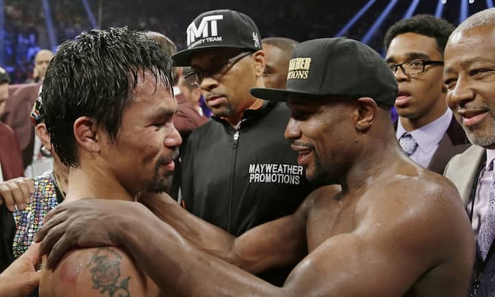 Platz 2: Manny Pacquiao Im Boxkampf des Jahres unterlag Manny Pacquiao (li.) seinem Kontrahenten Floyd Mayweather. Doch der philippinische Boxer wurde fürstlich entlohnt: Dank des Kampfes landet der 36-Jährige mit 160 Millionen Dollar auf Platz zwei der «Forbes»-Liste.