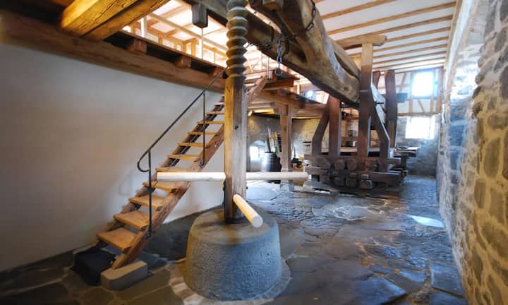 Das Mühlwerk ist dem Gebäude erhalten geblieben, was...