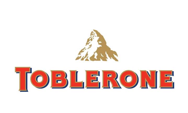 Der Berg ruft auf dem Logo des Schokoladenherstellers aus Bern. Toblerone hat nicht nur das Matterhorn zu seinem Markenzeichen gemacht, sondern auch das brummige Wappentier der Stadt: Wer genau hinsieht, erkennt den Berner Bären in der Mitte des Berges.