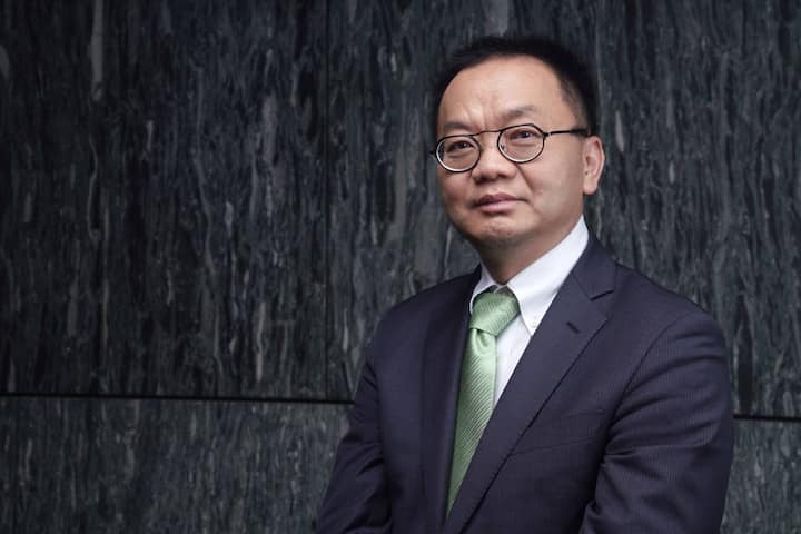 Chris Chen, chief executive officer of Wuxi Biologics Cayman Inc., poses for a photograph at the Bloomberg Invest Asia forum in Hong Kong, China, on Thursday, March 21, 2019. The forum brings together some of the biggest businesses and influential institutions. Photographer: Anthony Kwan/Bloomberg