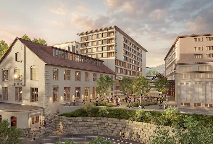 Der Industriebau im Vordergrund bleibt erhalten. Dahinter entsteht ein Nebau.