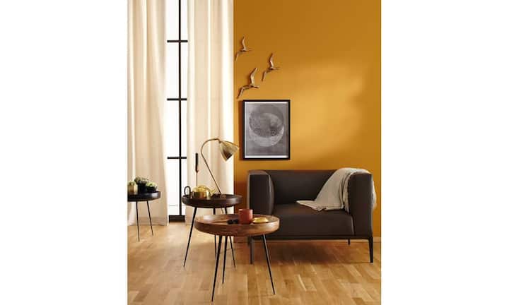 Tiefe Töne und edles Nussbaumholz vermitteln dabei Geborgenheit.